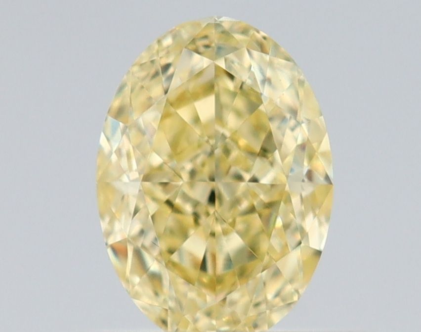 0.55 Carat Oval Diamond Fancy Yellow VS2