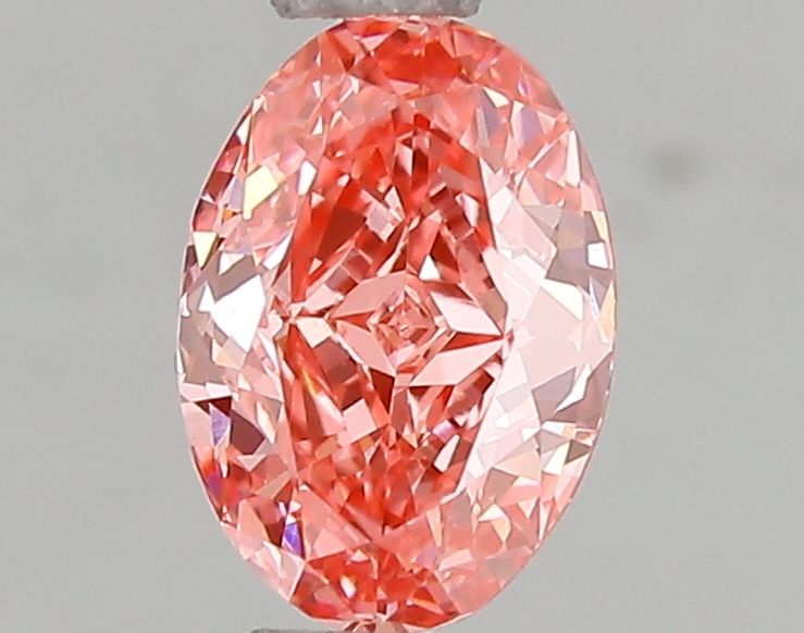 1.08 carat fancy vivid pink VVS2 EX Cut IGI oval diamond