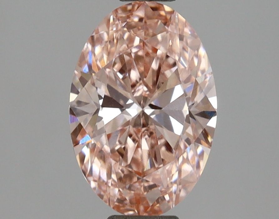 1.07 carat fancy vivid pink VVS2 EX Cut IGI oval diamond