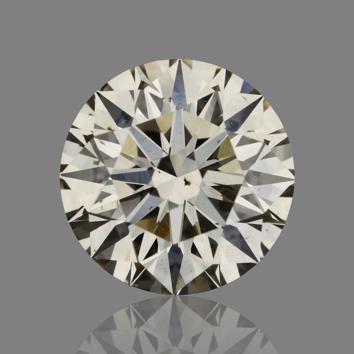 1.09 Carat Round Diamond K FAINT BROWN SI1