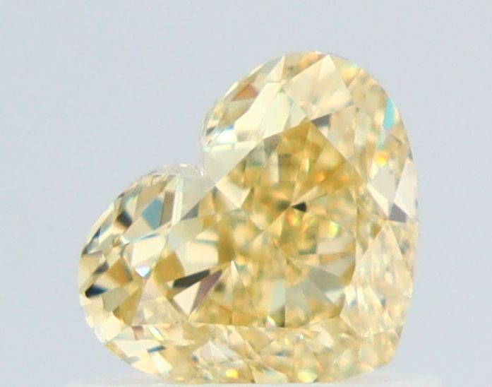0.81 Carat Heart Diamond Fancy Yellow VVS1