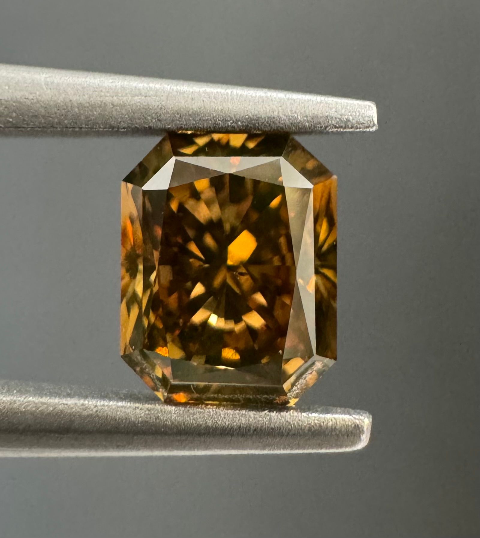 0.61 Carat Radiant Diamond Fancy Dark Yellowish Brown SI1
