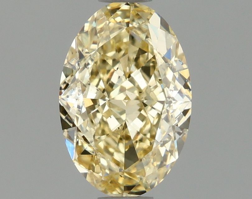 1.07 carat fancy intense yellow VS2 EX Cut IGI oval diamond