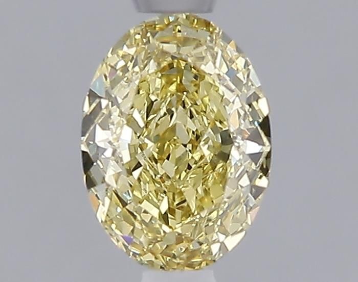 1.03 carat fancy yellow VS1 EX Cut IGI oval diamond