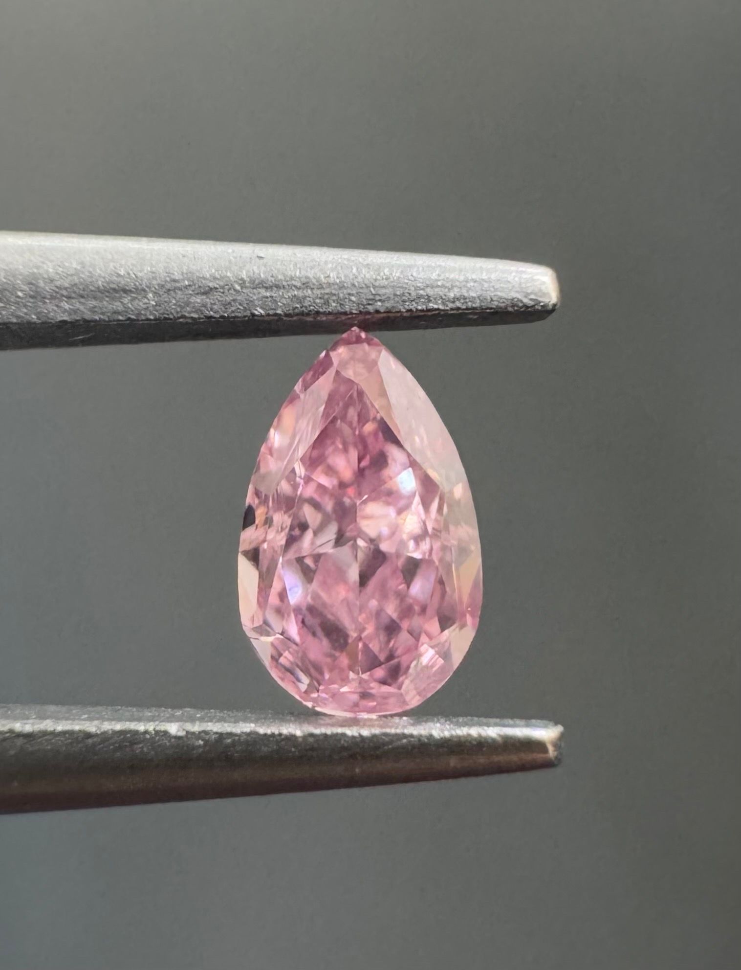 0.16 Carat Pear Diamond Fancy Intense Purplish Pink SI1
