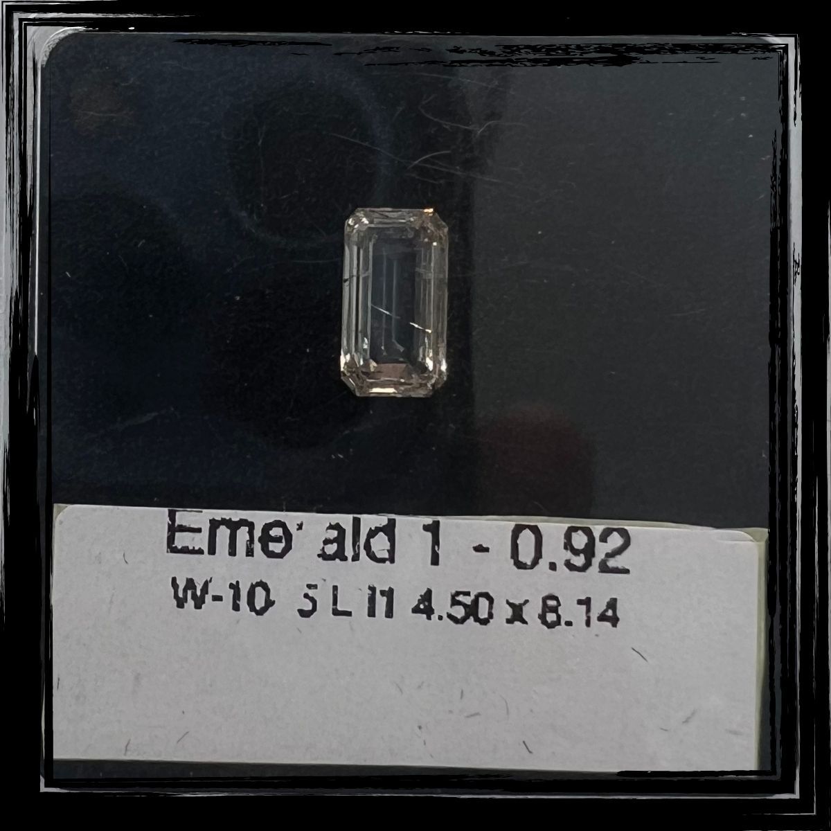 0.92 Carat Emerald Diamond L I1