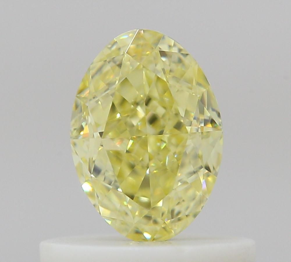 0.57 Carat Oval Diamond Fancy Yellow VVS2