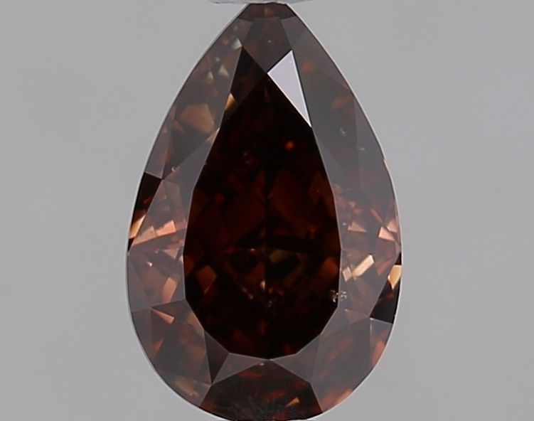 0.56ct Pear ORANGE SI1
