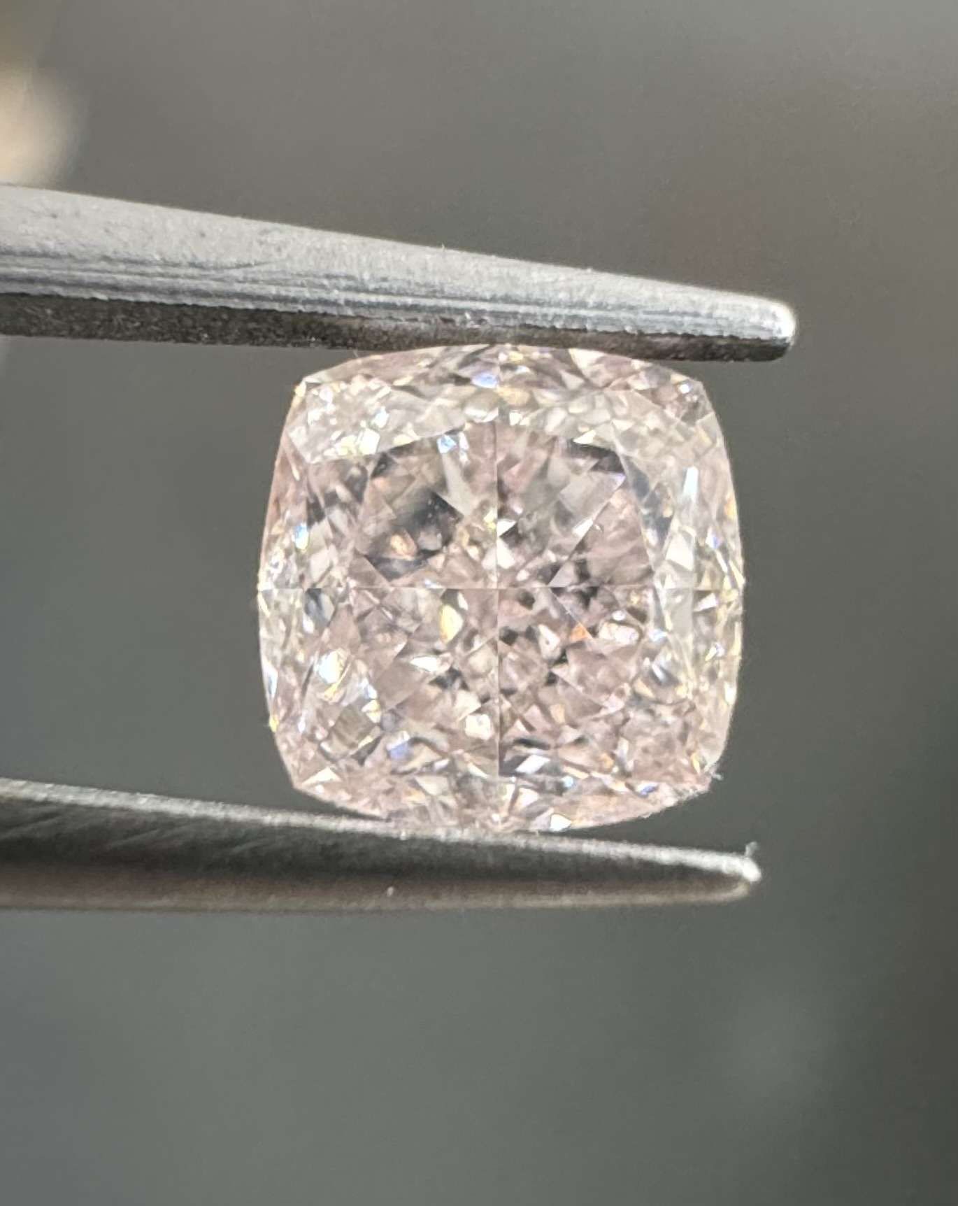 0.62 Carat Cushion brilliant Diamond Fancy Light Orangey Pink VS2