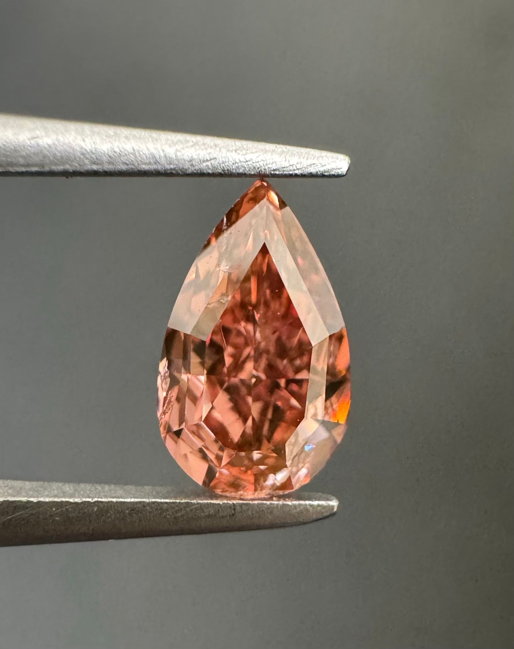 0.71 Carat Pear Diamond Fancy Deep Orangey Pink 