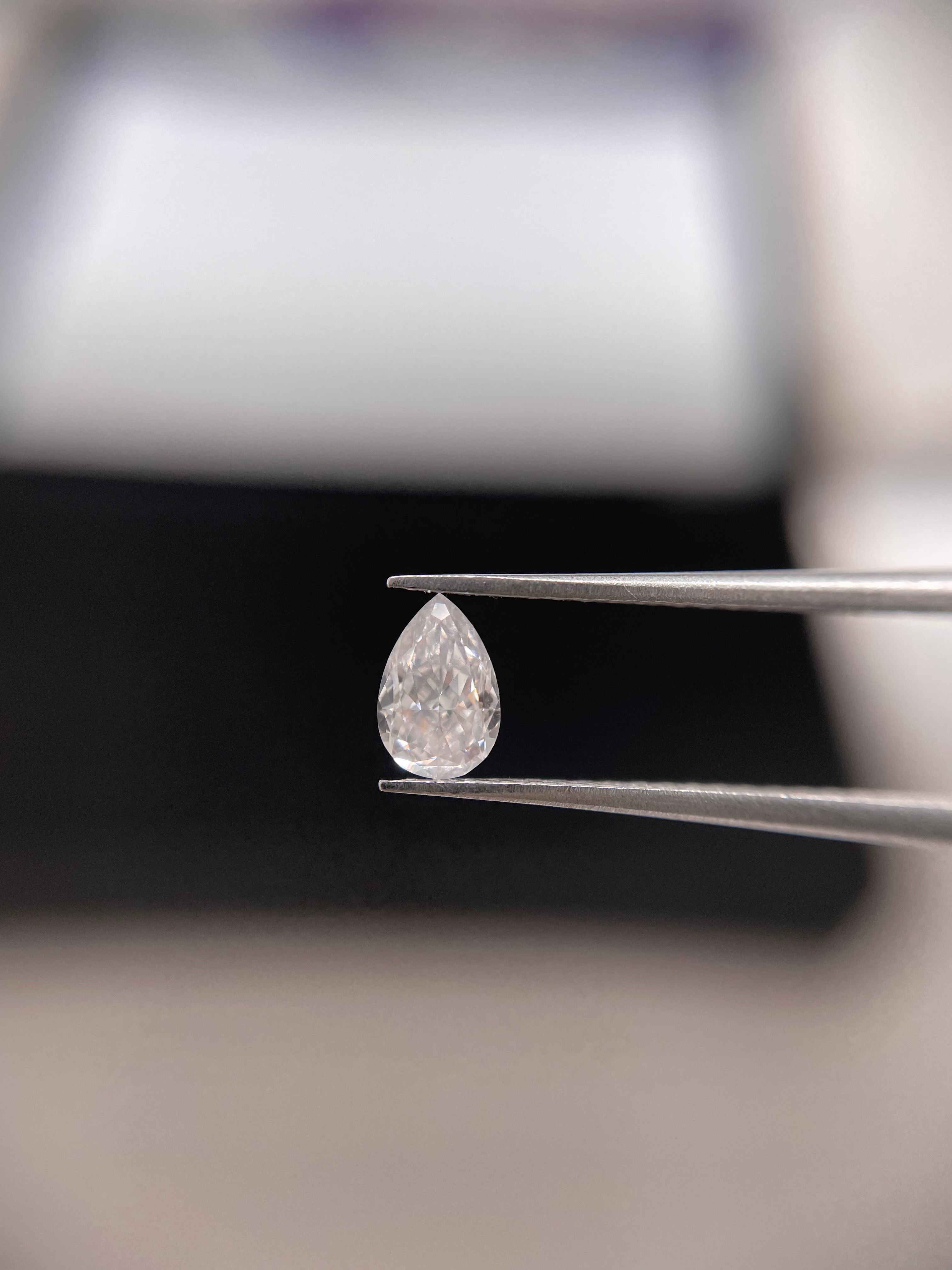 0.32 Carat Pear Diamond Faint Pink SI2