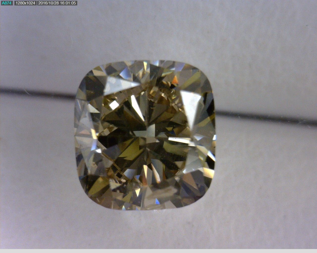 1.06ct Cushion Brilliant CHAMPAGNE I1