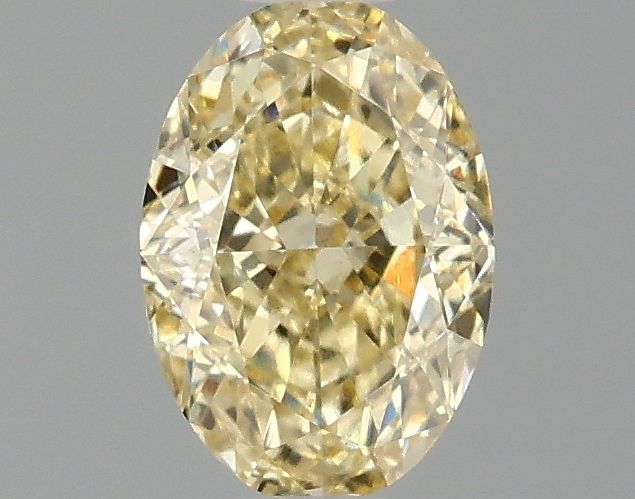 1.05 carat fancy yellow VS1 EX Cut IGI oval diamond
