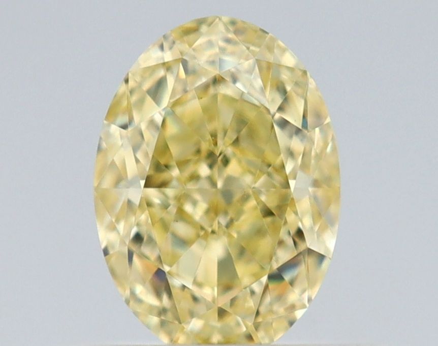 0.58 Carat Oval Diamond Fancy Yellow VS1