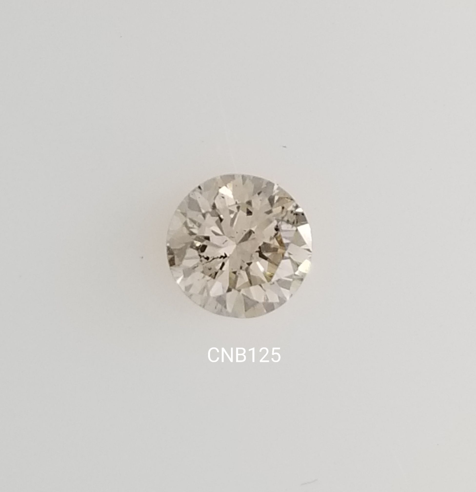 0.84ct Round CHAMPAGNE SI2