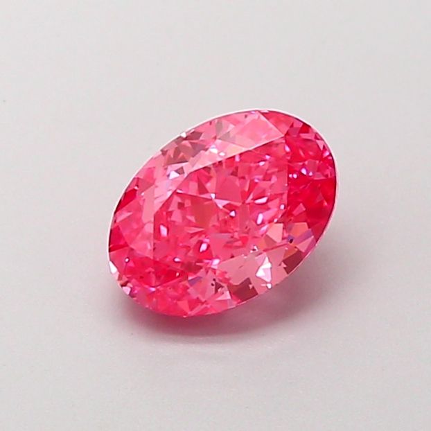 1.21 carat fancy vivid pink VS2 EX Cut IGI oval diamond