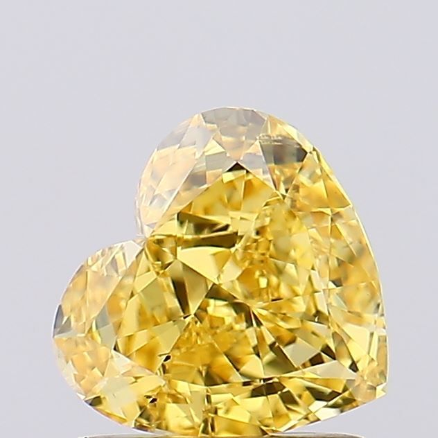 1.17 carat fancy vivid yellow VS2 EX Cut IGI heart diamond