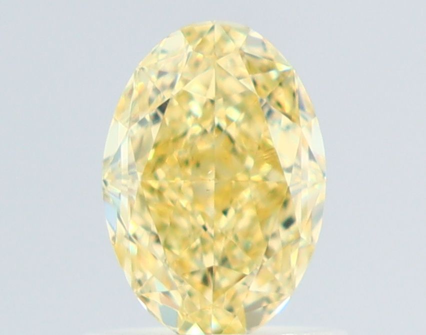 1.01 Carat Oval Diamond Fancy Yellow VS1