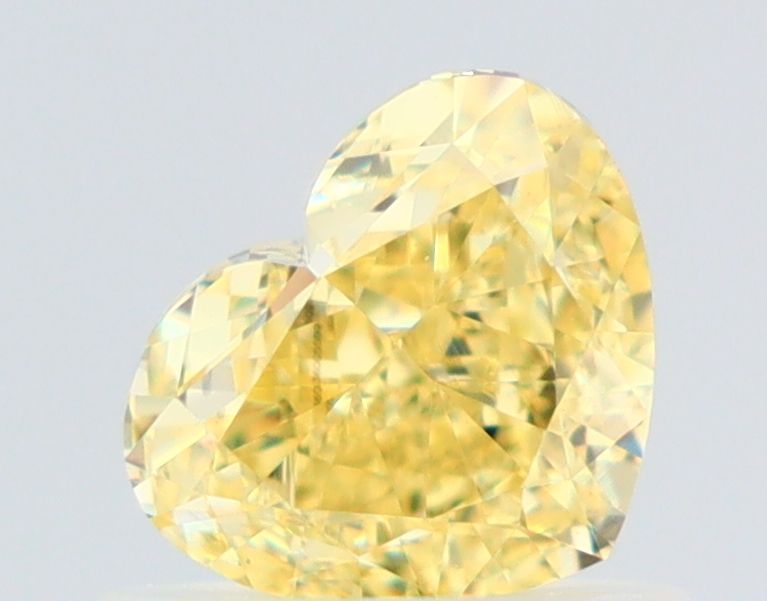 0.76 Carat Heart Diamond Fancy Intense Yellow VS1