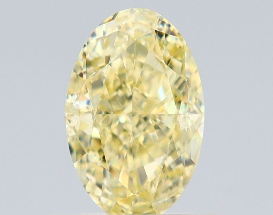 0.9 Carat Oval Diamond Fancy Yellow VS2
