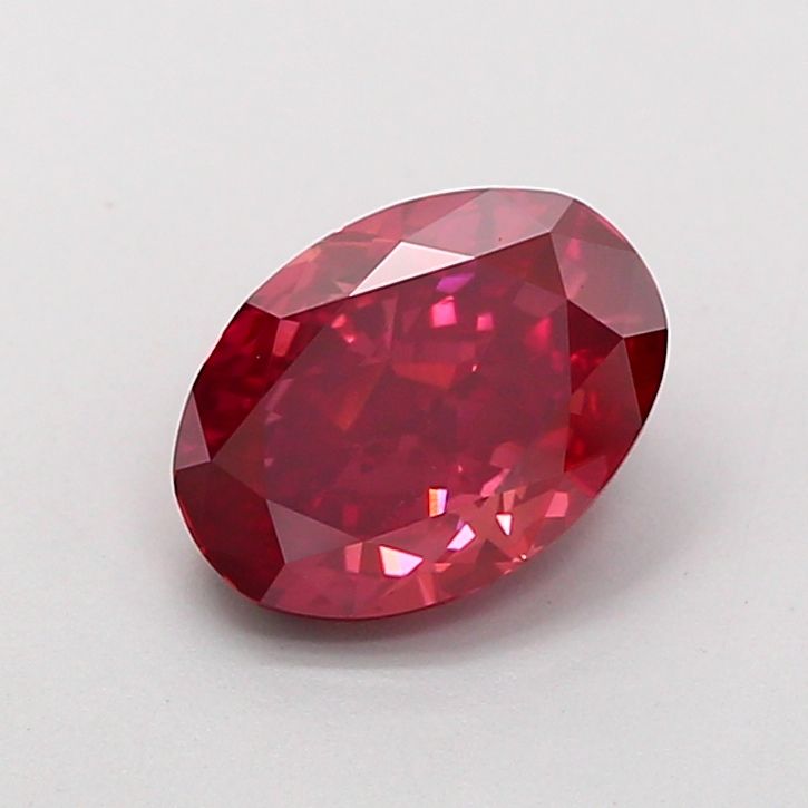 1.55 carat fancy vivid red VS1 EX Cut IGI oval diamond