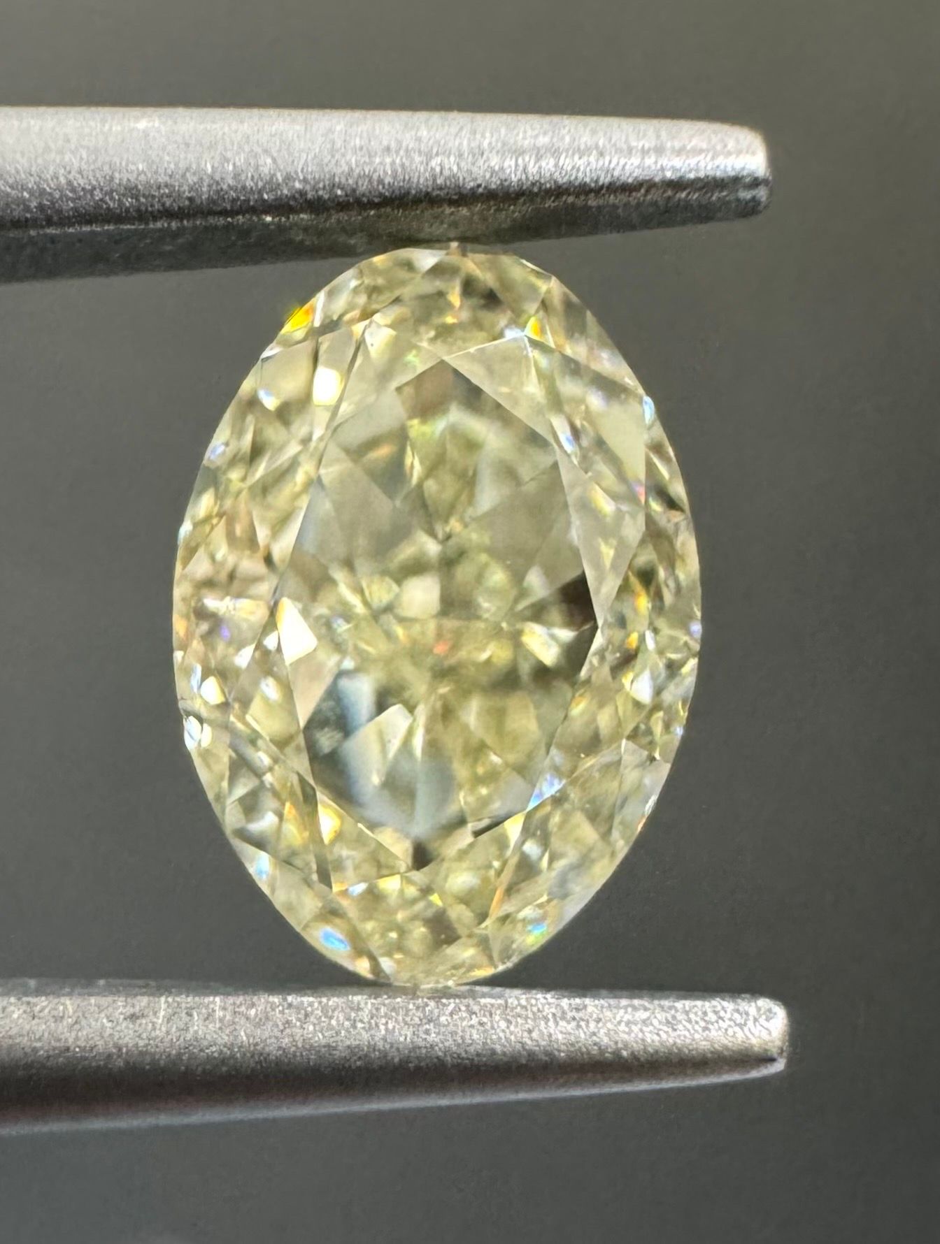 0.91 Carat Oval Diamond U-V SI1