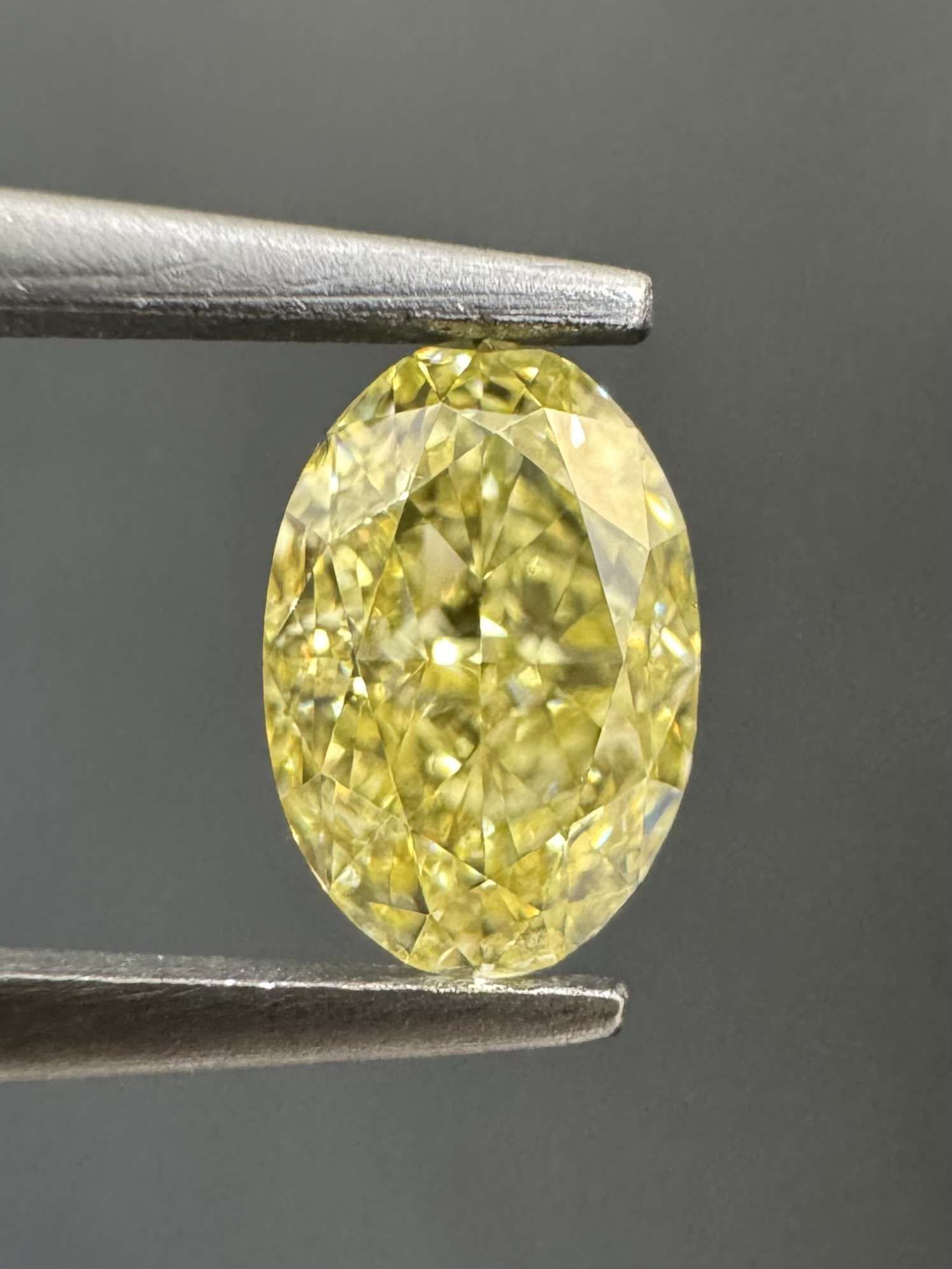 0.53 Carat Oval Diamond Fancy Yellow VVS1