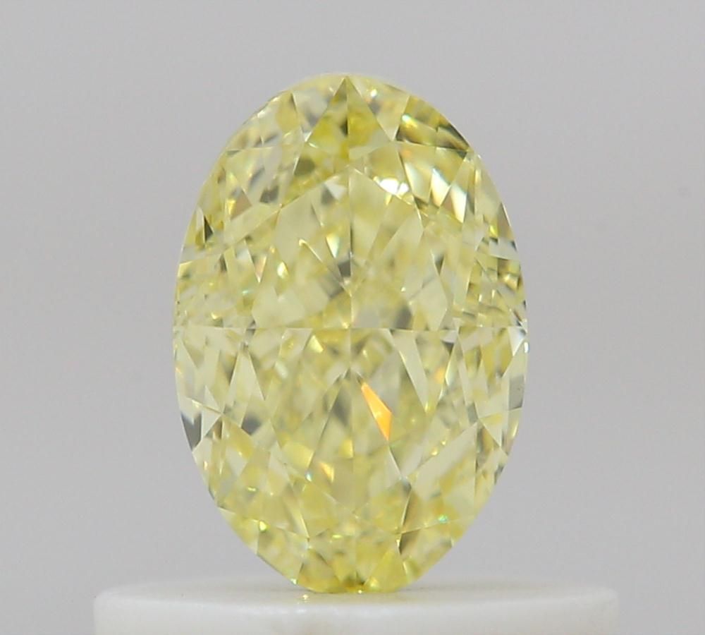 0.56 Carat Oval Diamond Fancy Yellow VS1