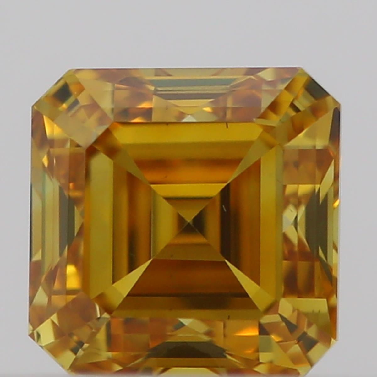 0.32 Carat Square emerald Diamond Fancy Vivid Orange Yellow VS2