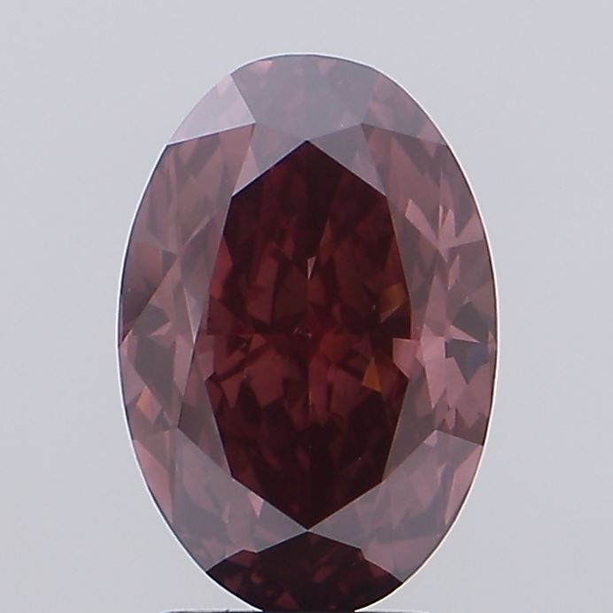 3.53 carat fancy deep pink VVS2 EX Cut IGI oval diamond
